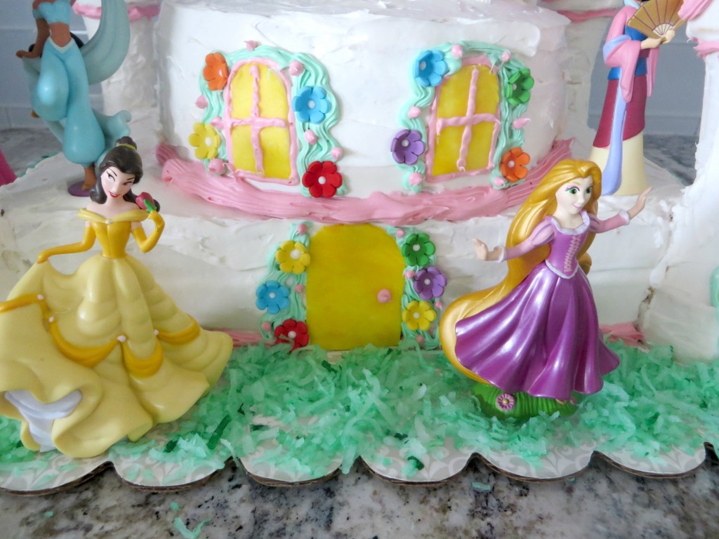 Once you finish this easy castle cake, it's time to add some Disney princesses