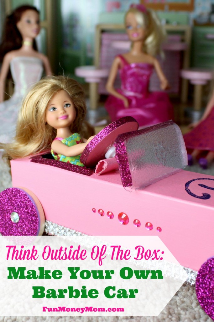 Barbie in car with other Barbies in the background