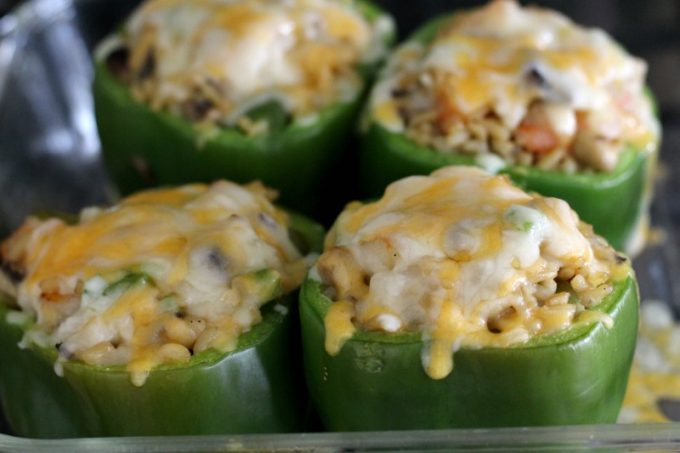 Topping these shrimp stuffed bell peppers with cheese makes them even better!