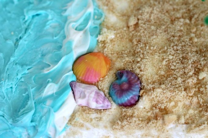 Top your Moana birthday cake with pretty seashells 