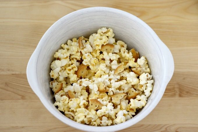 Combine crackers and popcorn in a bowl for your movie night snacks