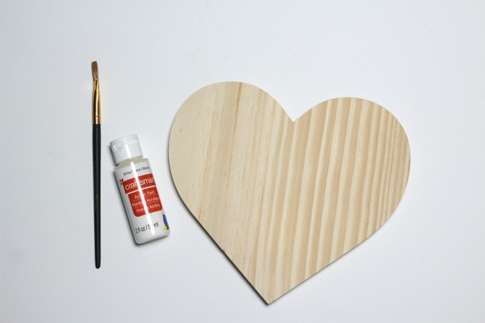 You can use a wooden heart to make easy DIY wall art.