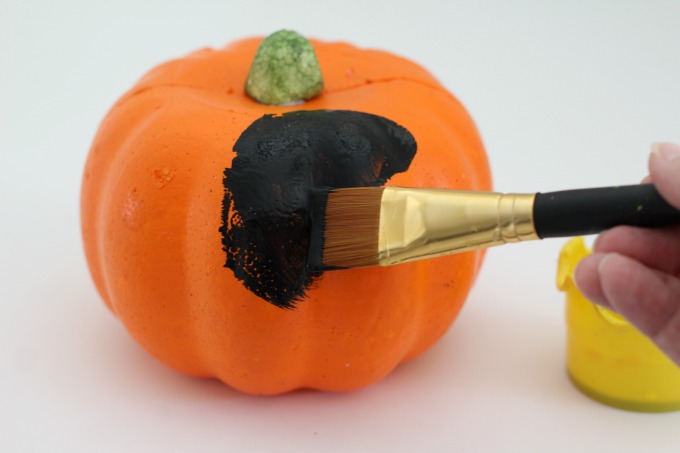 If you use a foam pumpkin for your black cat pumpkin, you can display it every year