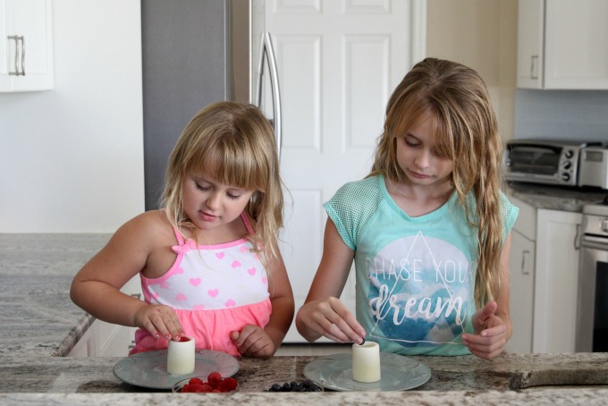 Let kids fill their frozen yogurt cups with fruit