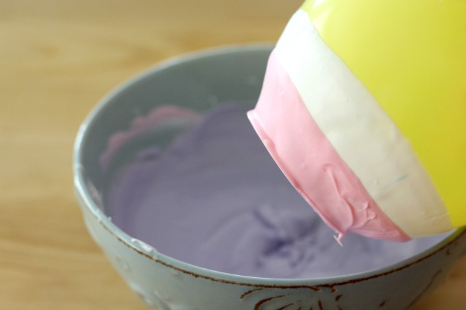 Use different colored candy melts to make stripes on the edible chocolate bowls