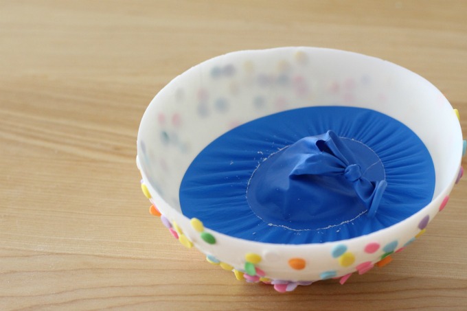 Once the balloons deflate, remove them from the edible chocolate bowls