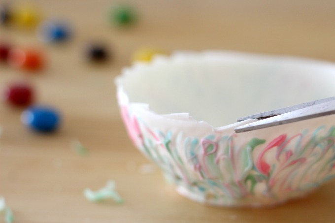 Snip the edges of your edible chocolate bowls for a cracked egg look
