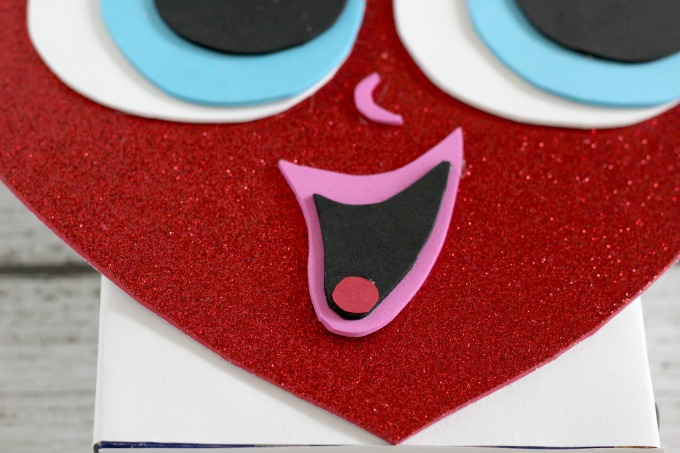 Next, give your heart shaped Valentine box a mouth