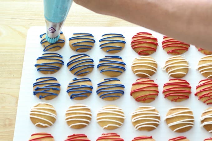 Use a decorating bag to top the NILLA Wafers with no bake cheesecake