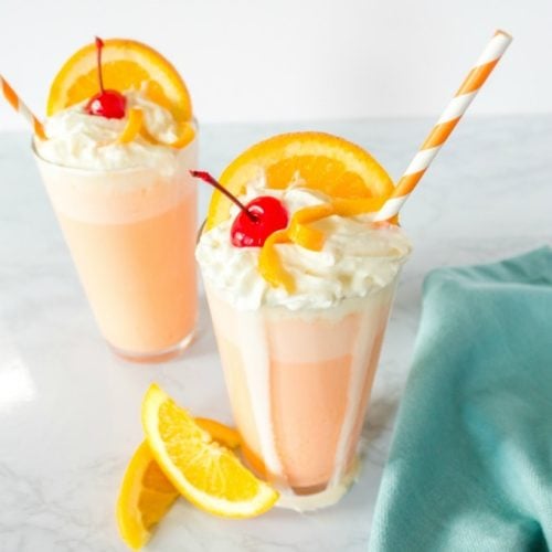 Orange creamsicle milkshakes with garnish