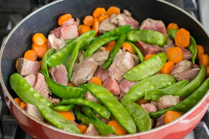 Beef with snow peas and carrots