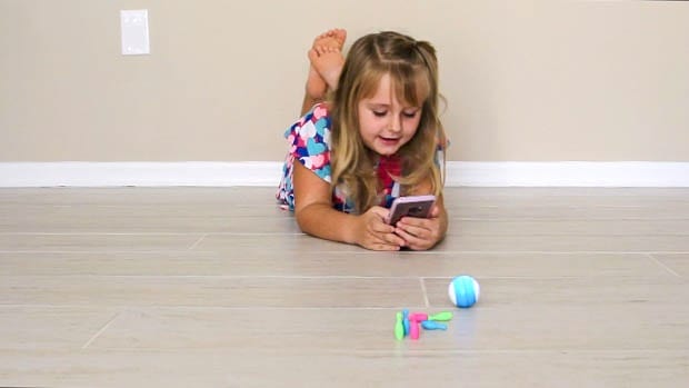 Keira playing with the Sphero Mini