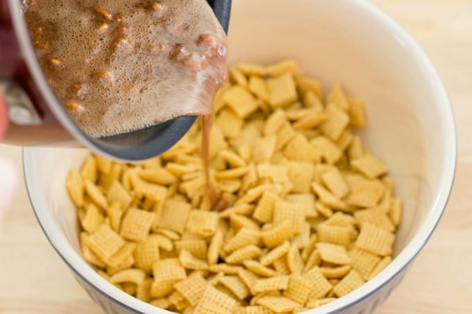 Pour the Snickers mixture over the Chex cereal