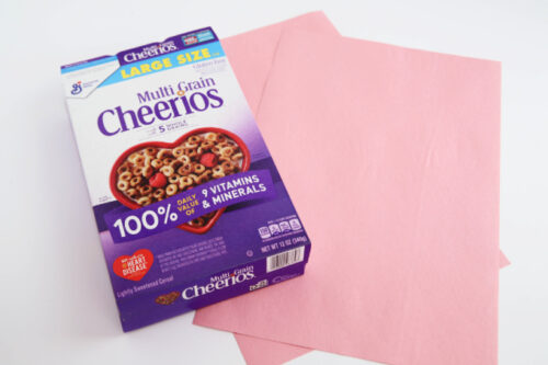 Cereal box with pink paper