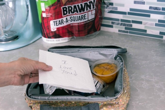 Putting Brawny paper towel in lunch box