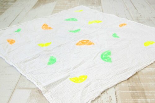 Dish towel painted with citrus
