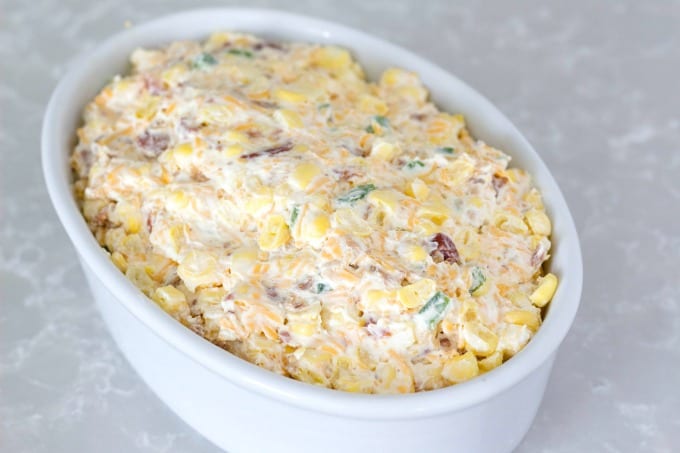 Cheese dip mixture in oven safe bowl