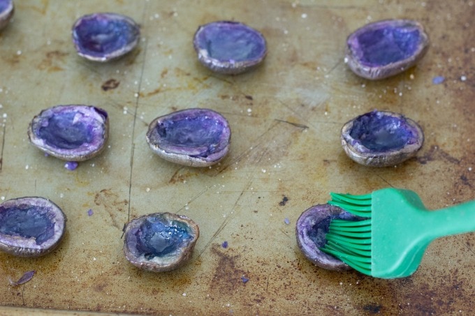 Coating purple potatoes with olive oil