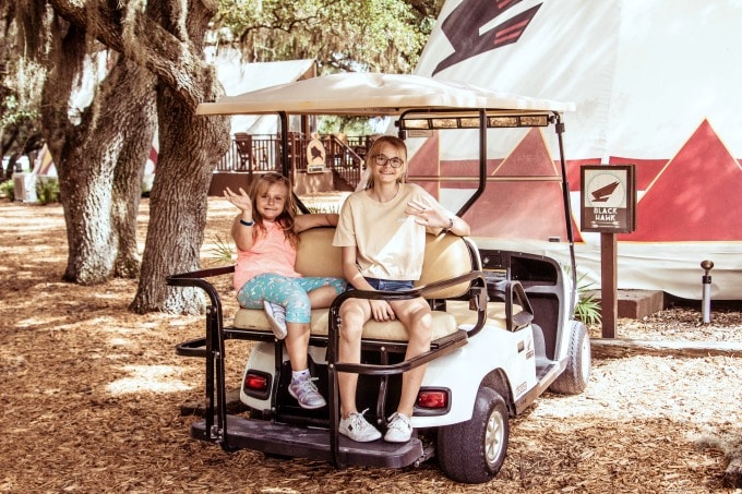 Kids in back of golf cart