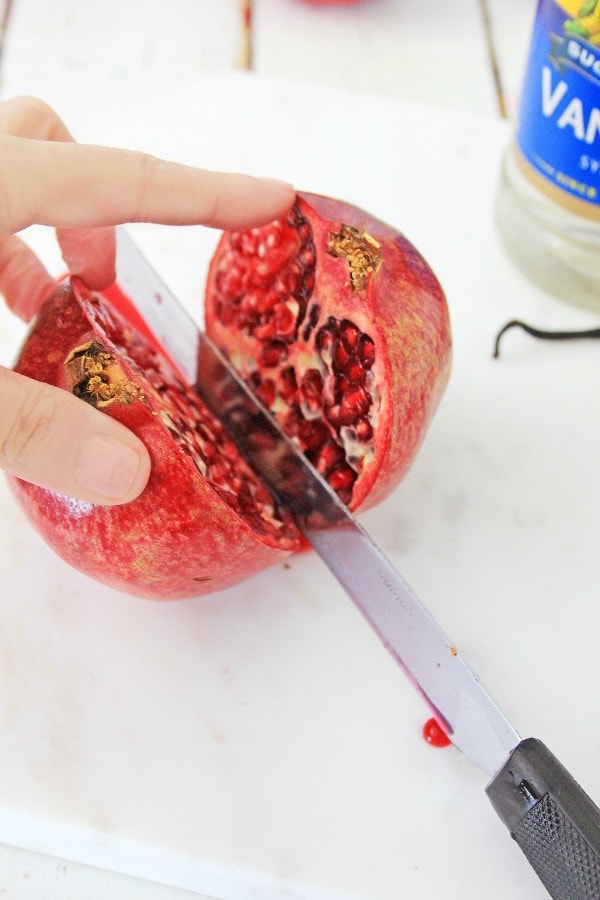 Cutting open a pomegranate