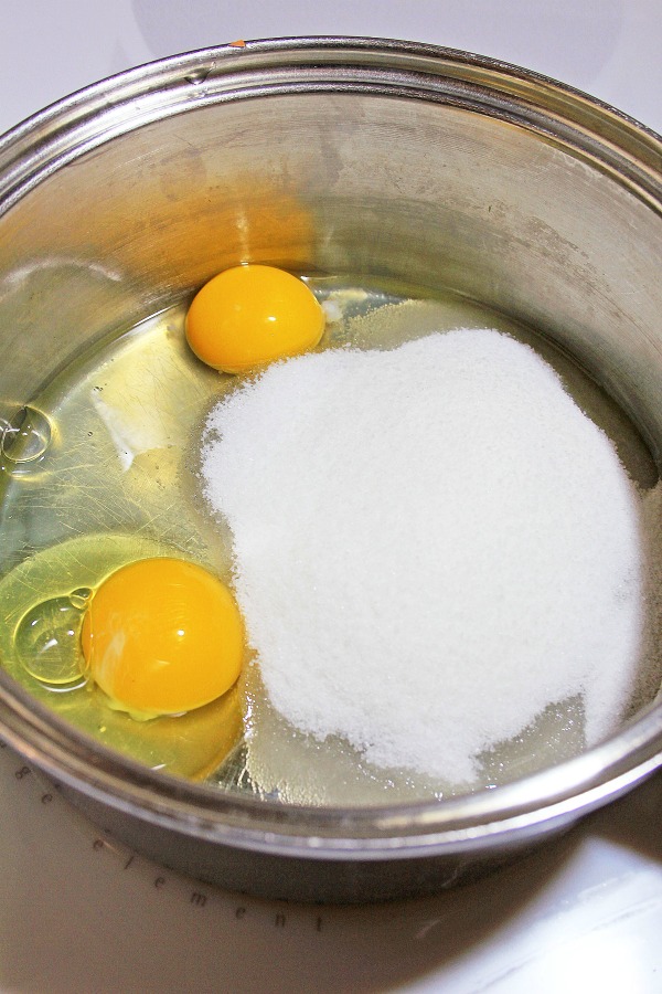 Eggs and sugar for spiced eggnog
