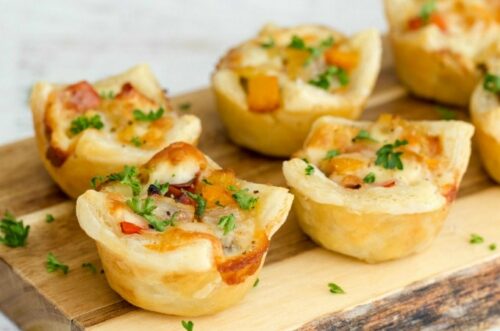 Puff pastry bites on cutting board