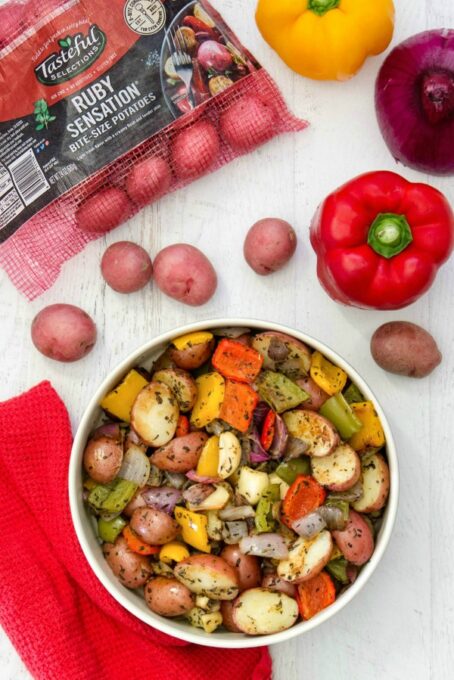 Roasted potatoes and vegetables in bowl