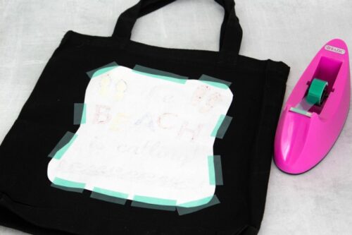 Sublimation marker design taped to tote bag