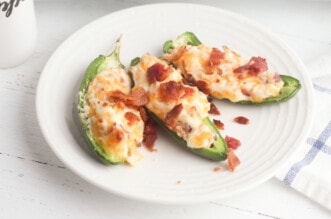 Jalapeno poppers on white plate