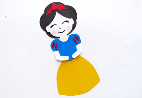 Finished Snow White paper doll on white background