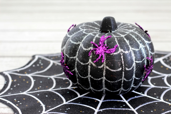 Spiderweb pumpkin with purple spiders
