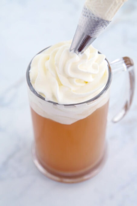 Topping Butterbeer with whipped cream