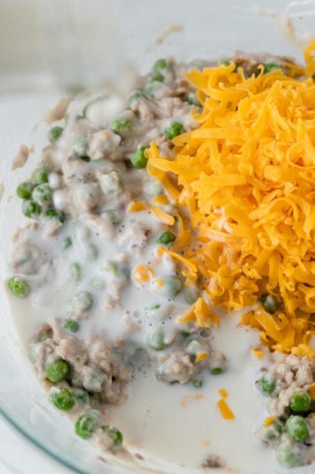 Combining tuna, cheese, peas and more