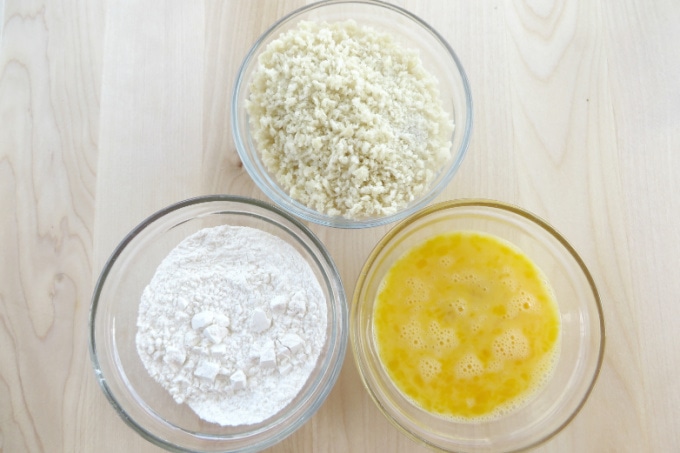 eggs, flour and bread crumbs in bowls