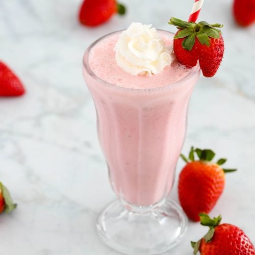 Strawberry milkshake with whipped cream