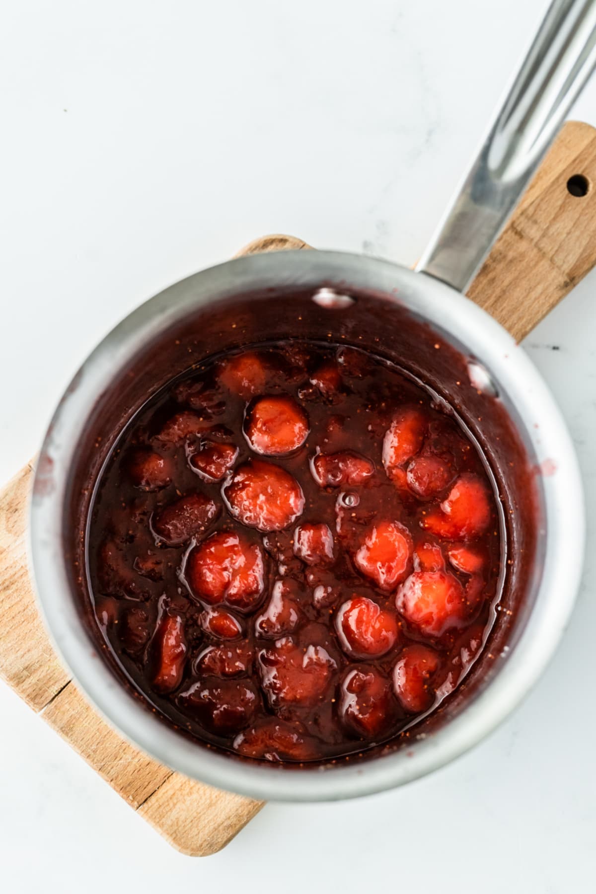 Strawberry sauce in saucepan