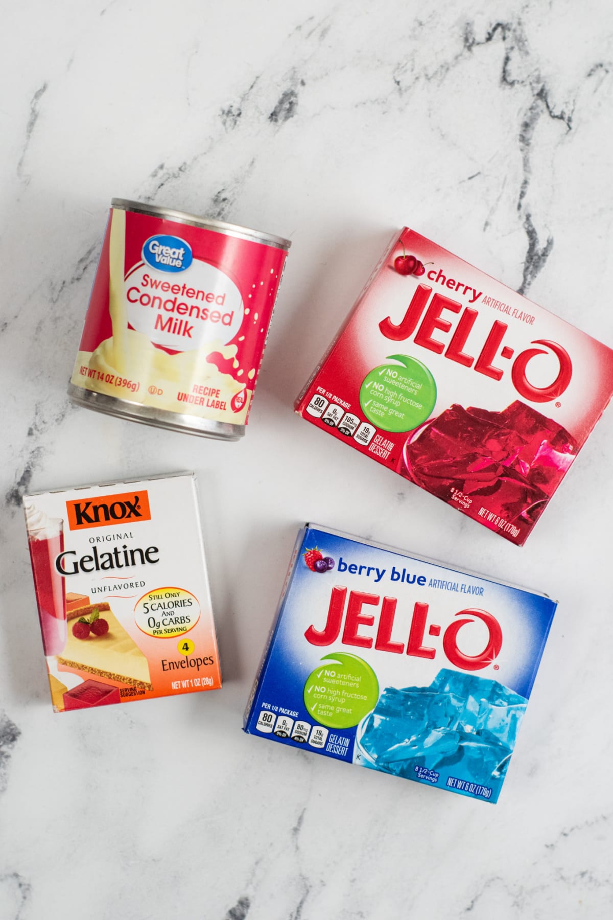 Ingredients for red, white and blue jello desserts