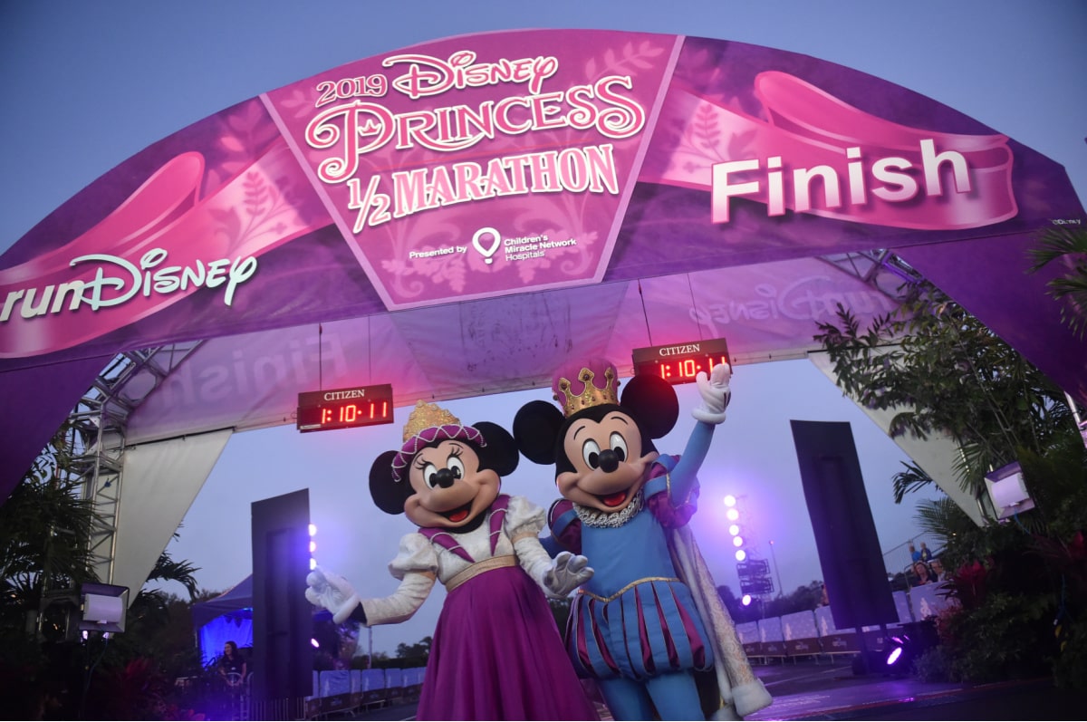 Mickey and Minnie Mouse at runDisney, where AdventHealth gives support and first aid at Disney World