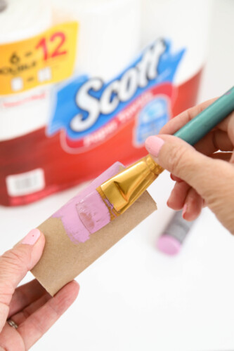 Painting toilet paper roll with acrylic paint