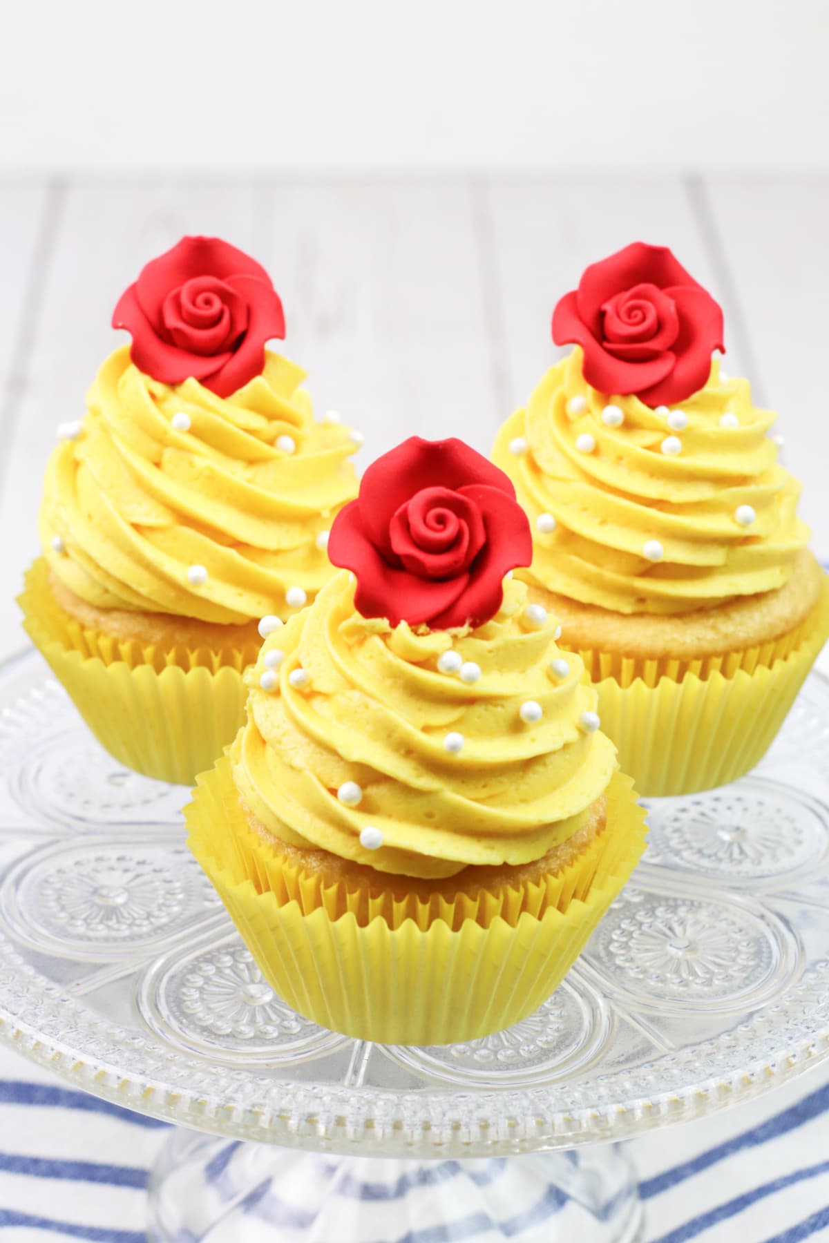 Beauty And The Beast cupcakes on glass plate