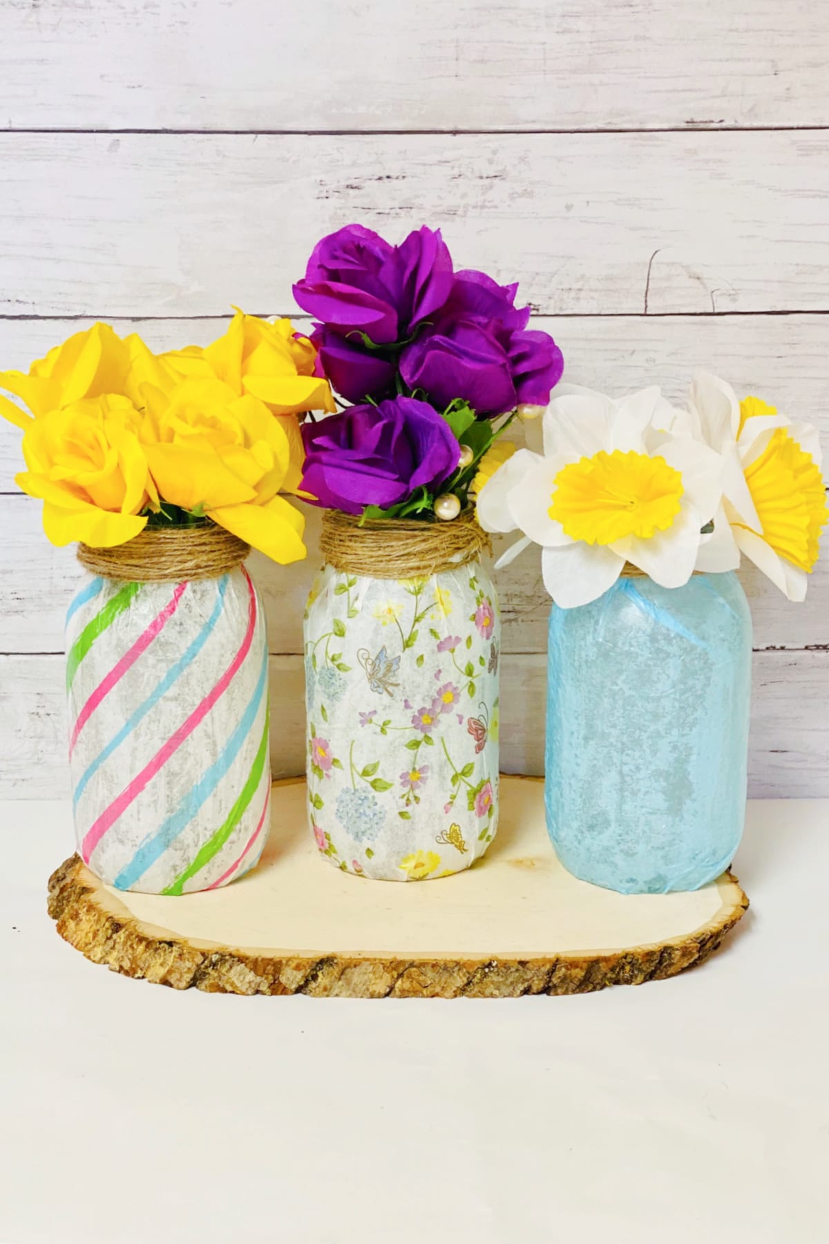 Mason jar vases with colorful flowers