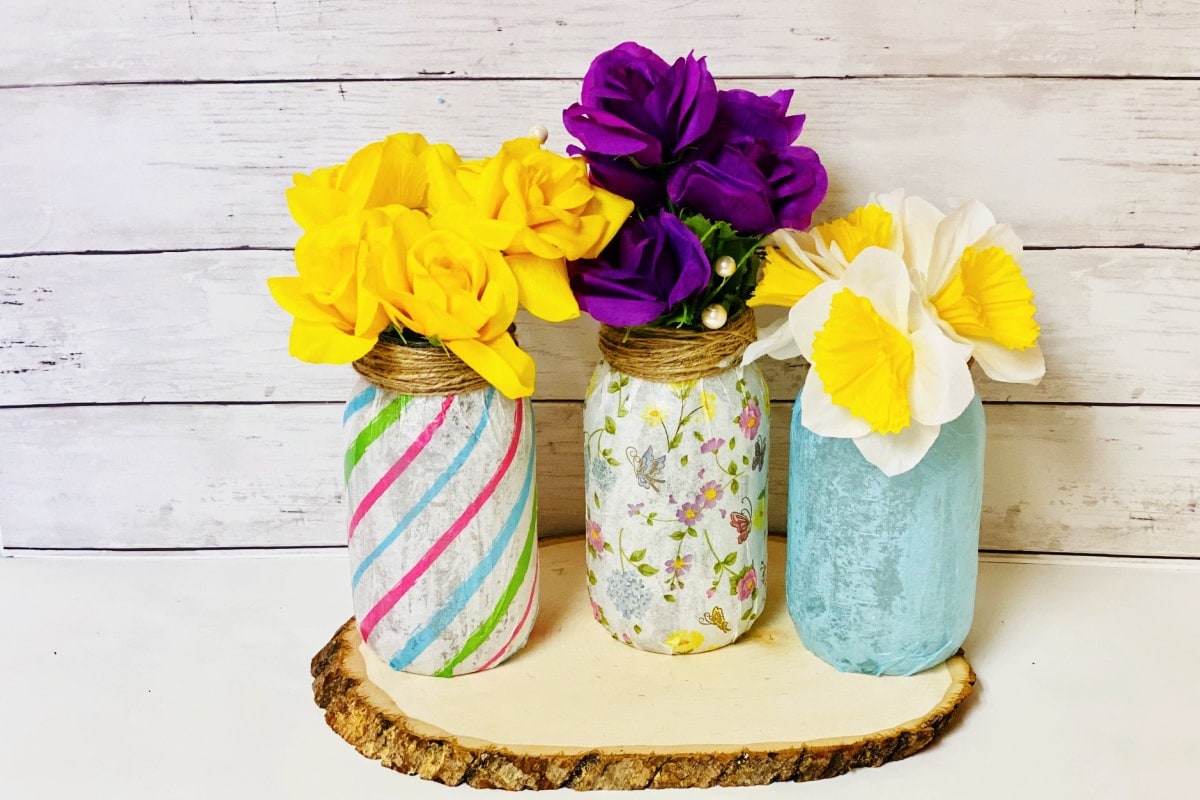 Mason jar vase with colorful flowers