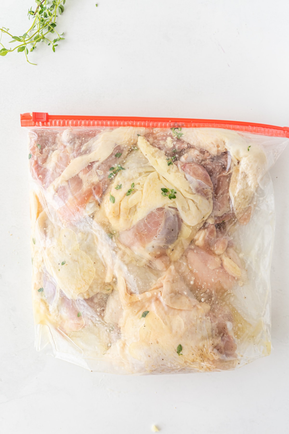 sheet pan chicken in bag with marinade