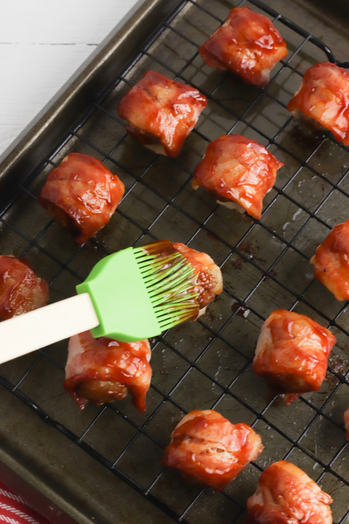 Brushing appetizers with bbq sauce