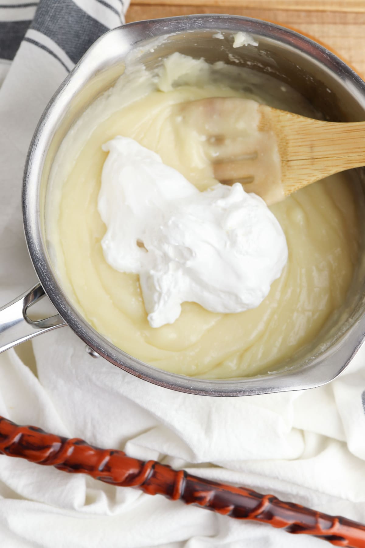 Marshmallow creme and vanilla extract stirred into white chocolate