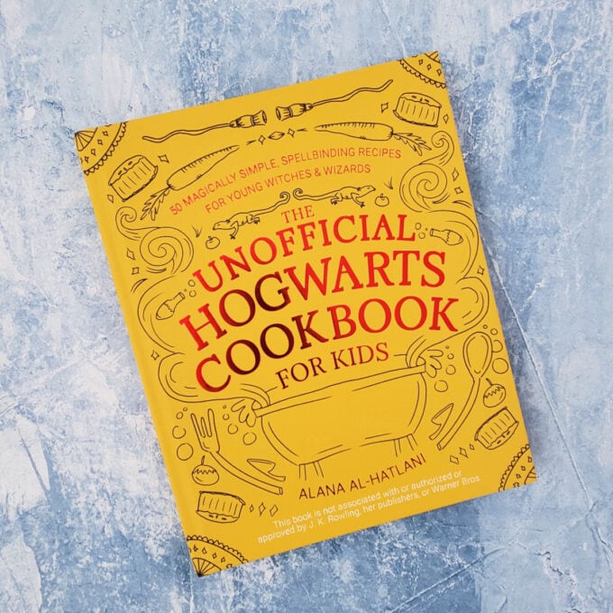 The Unofficial Hogwarts Cookbook on blue background
