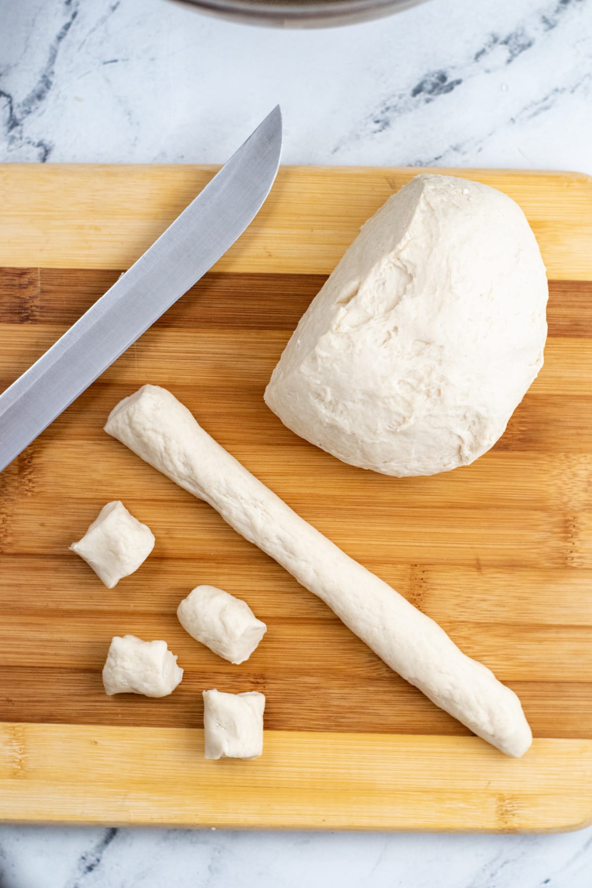 Pretzel dough on cutting board