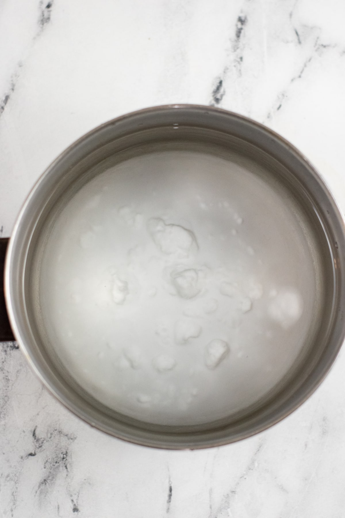 Large pot filled with water and baking soda