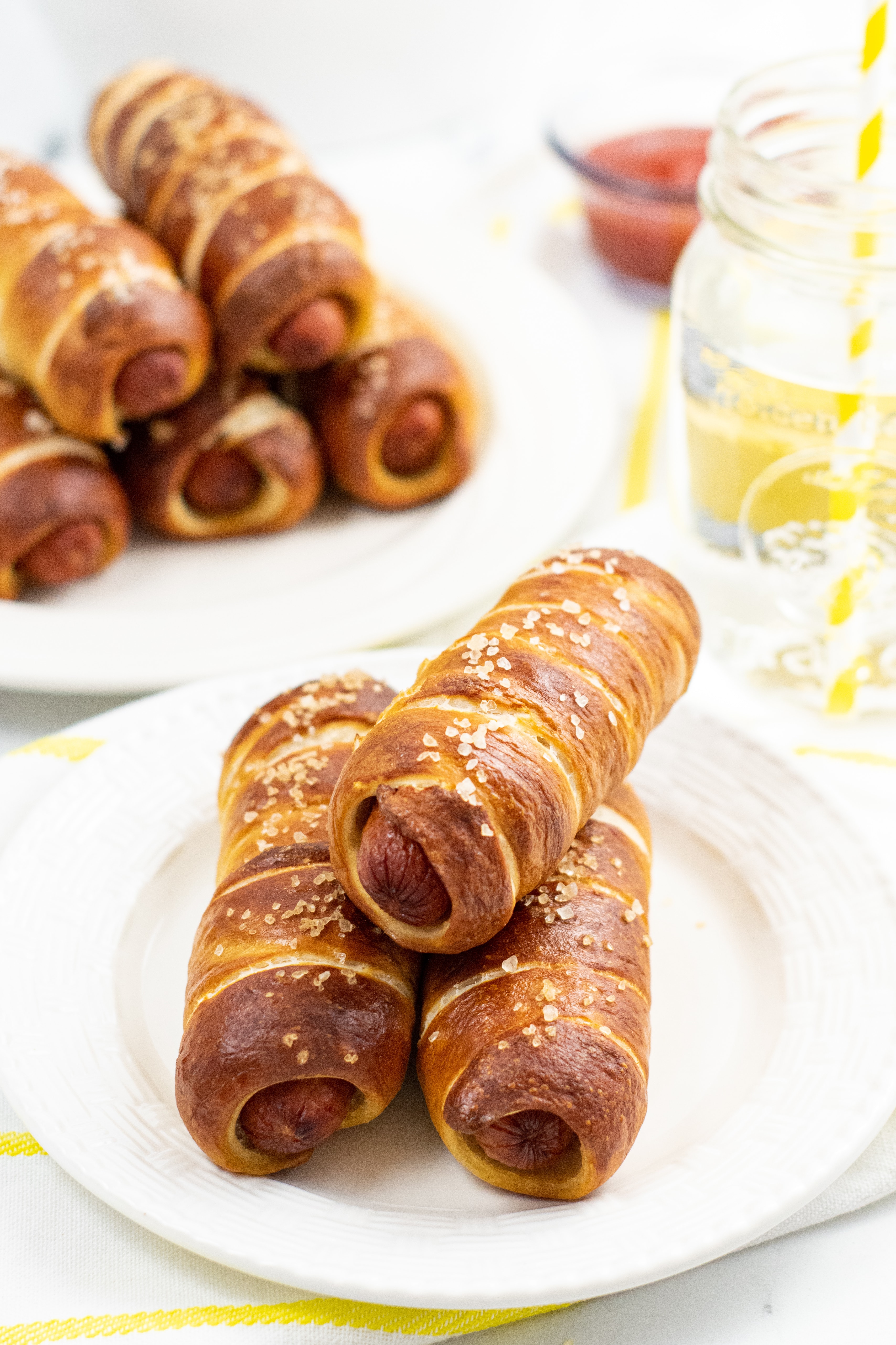 Pretzel dogs on a white plate