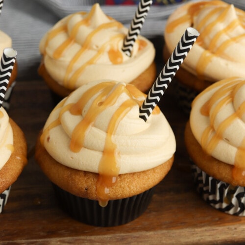 Butterbeer cupcakes with black and white straw